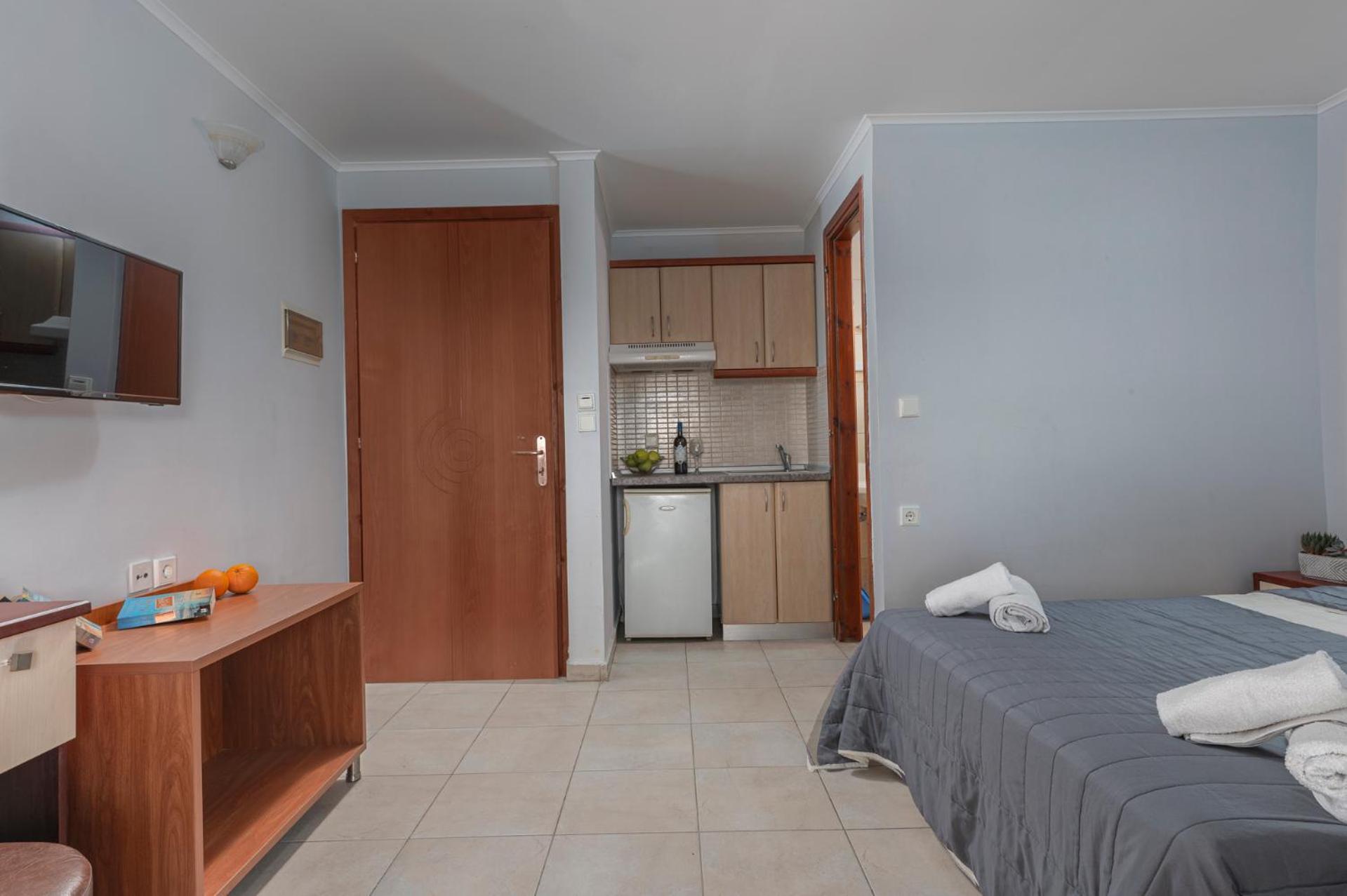 Adonis Hotel Pefkochori Pokoj fotografie